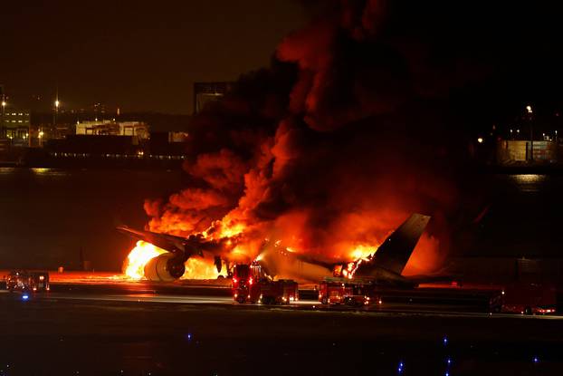 Japan Airlines' A350 airplane on fire at Haneda international airport in Tokyo