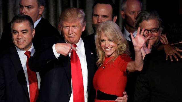 FILE PHOTO - Donald Trump and his campaign manager Kellyanne Conway greet supporters during his election night rally in Manhattan