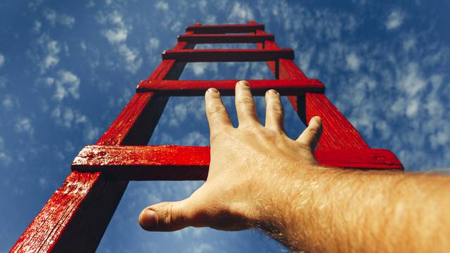 Development,Motivation,Career,Growth,Concept.,Mans,Hand,Reaching,For,Red