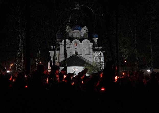 People attend an Orthodox Easter service in Moscow