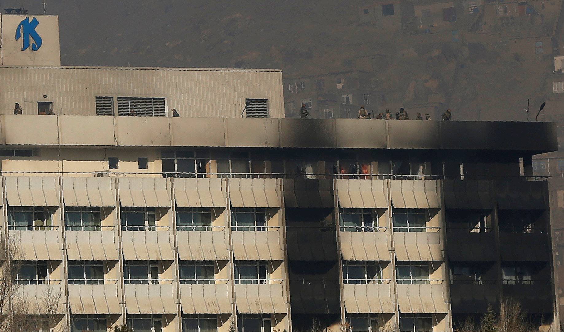 Afghan security forces are seen at the roof top of the Intercontinental Hotel in Kabul,ÃAfghanistan