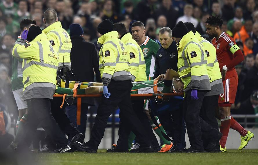 Republic of Ireland's Seamus Coleman is stretchered off injured