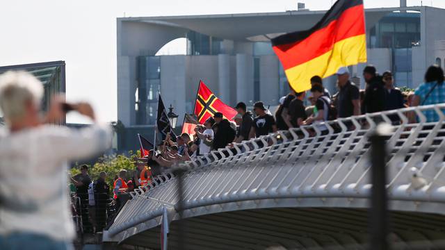 Right-wing protestors demonstrate in front of the chancellery in Berlin