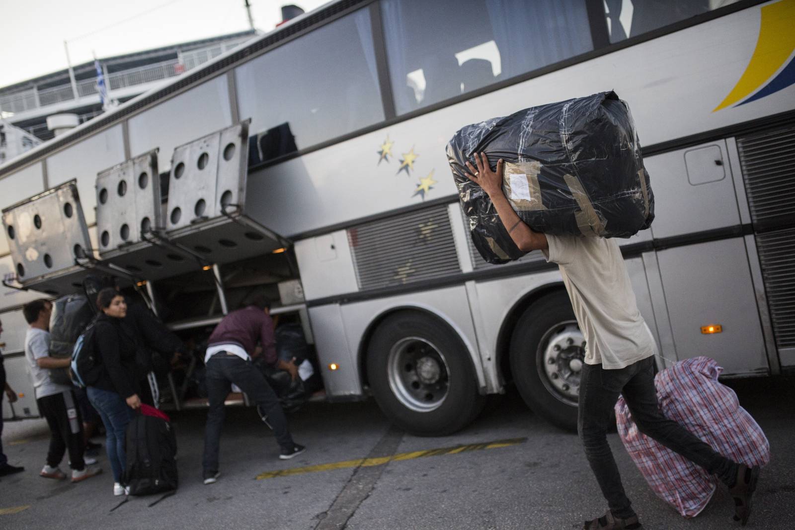 Refugees and migrants arrive in the port of Piraeus