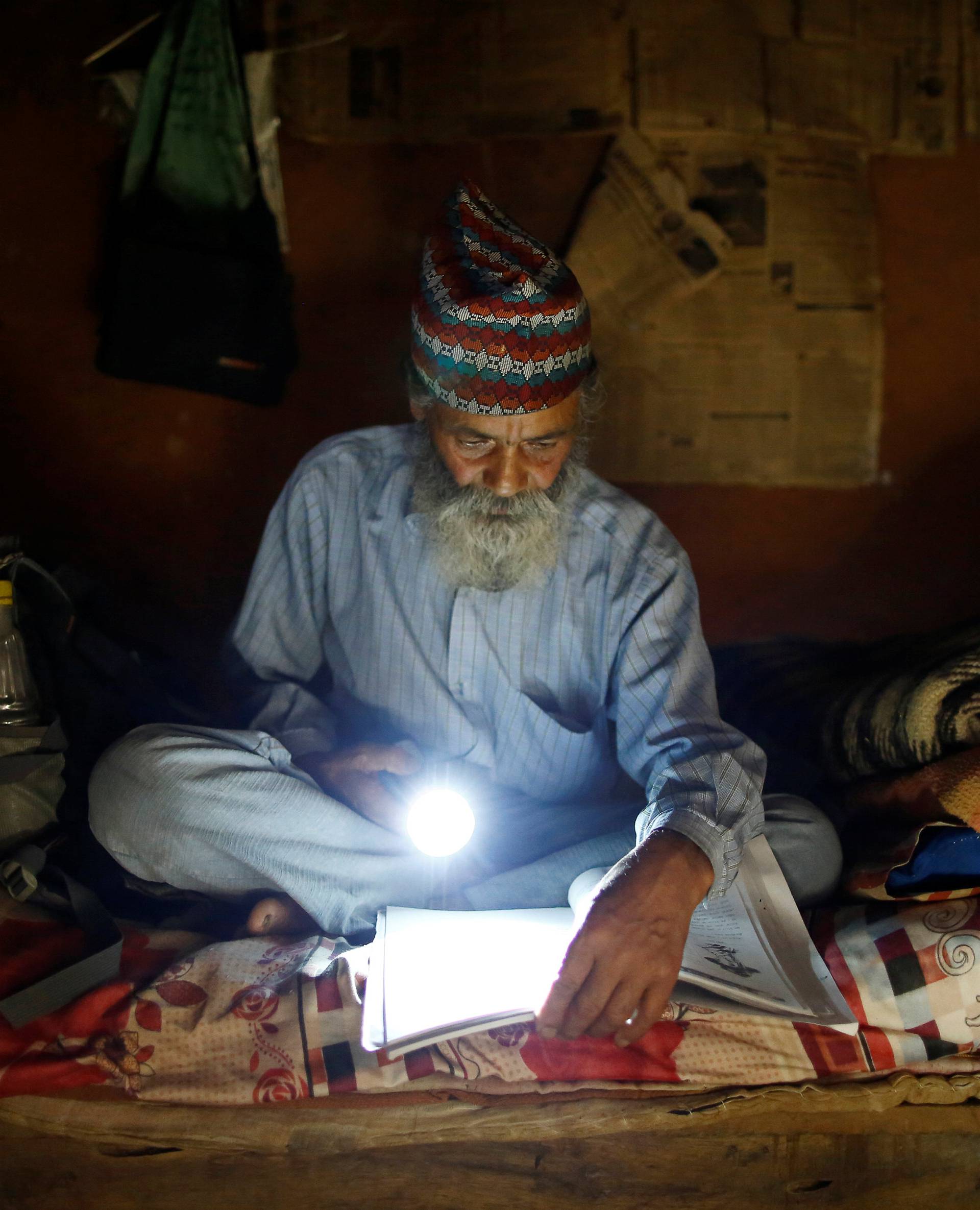 The Wider Image: Nepal's 68-year-old student