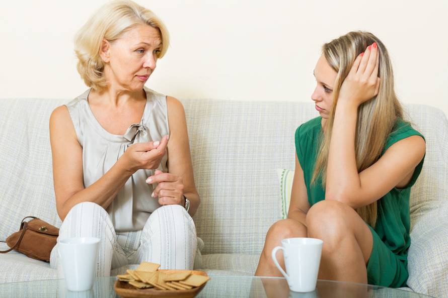  mature woman and  daughter  talking  