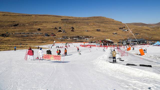 People ski and snowboard at Kapoko Snow Park at Afriski Mountain Resort in Butha Buthe