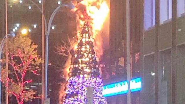 Christmas tree burns outside Fox News building in New York City