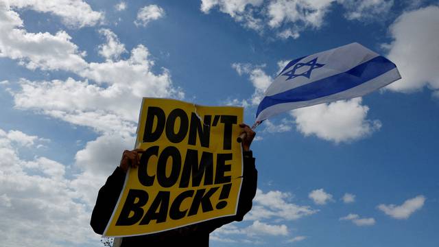 Protesters demonstrate at Ben Gurion International Airport, in Lod
