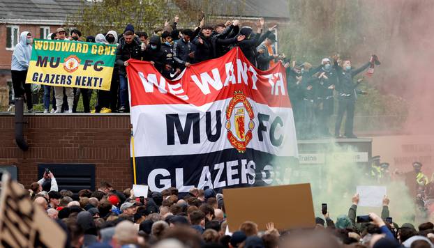 Manchester United fans protest against their owners before the Manchester United v Liverpool Premier League match