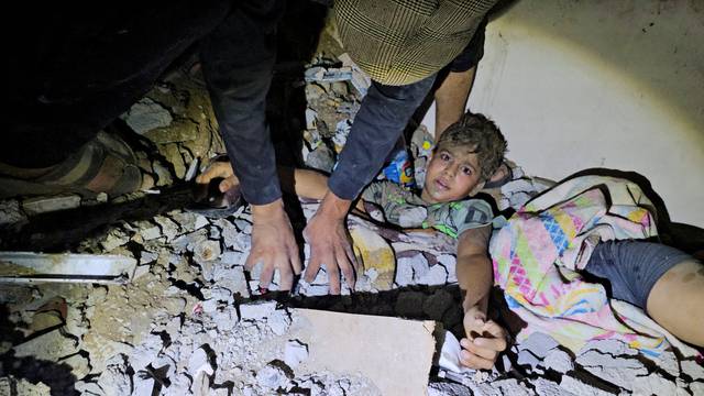 Aftermath of an Israeli strike on a house in Jabalia