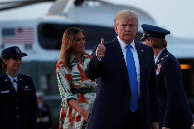 U.S. President Donald Trump and first lady Melania Trump depart for travel to Britain from Joint Base Andrews, Maryland