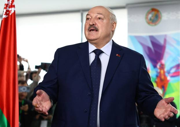 Belarusian President Alexander Lukashenko votes during the presidential election in Minsk