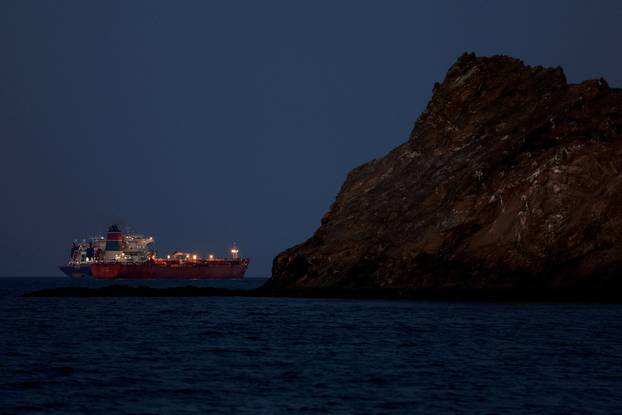 FILE PHOTO: FILE PHOTO: The Callisto tanker sits anchored as the traffic is down in the Strait of Hormuz, in Muscat