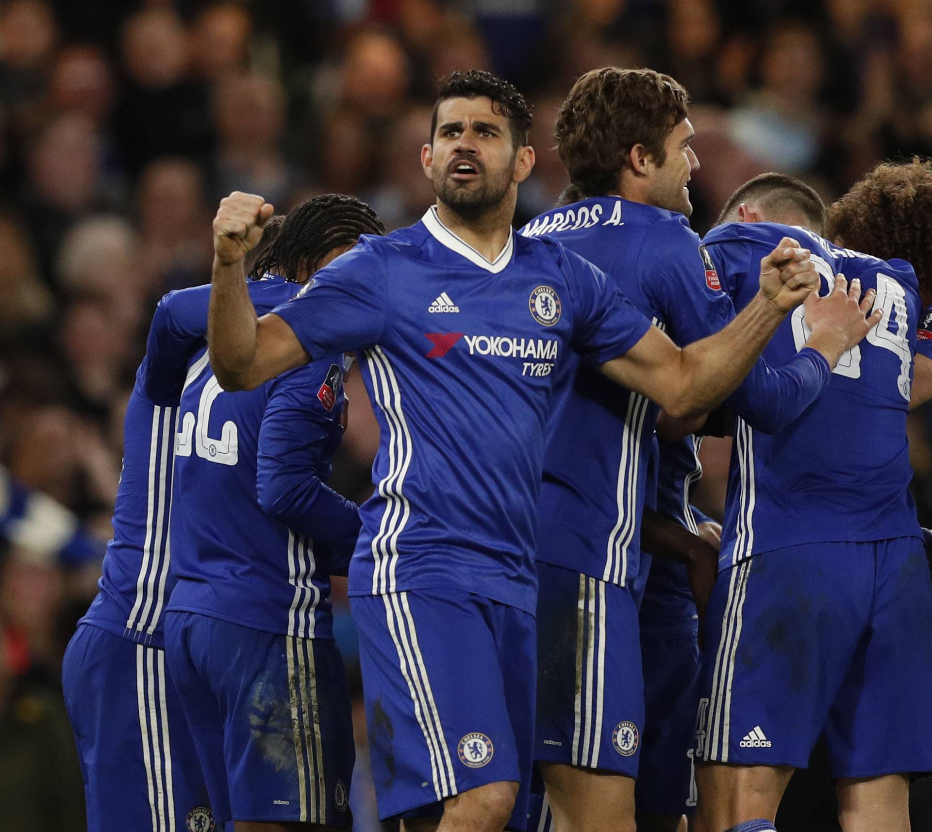 Chelsea's N'Golo Kante celebrates scoring their first goal with teammates
