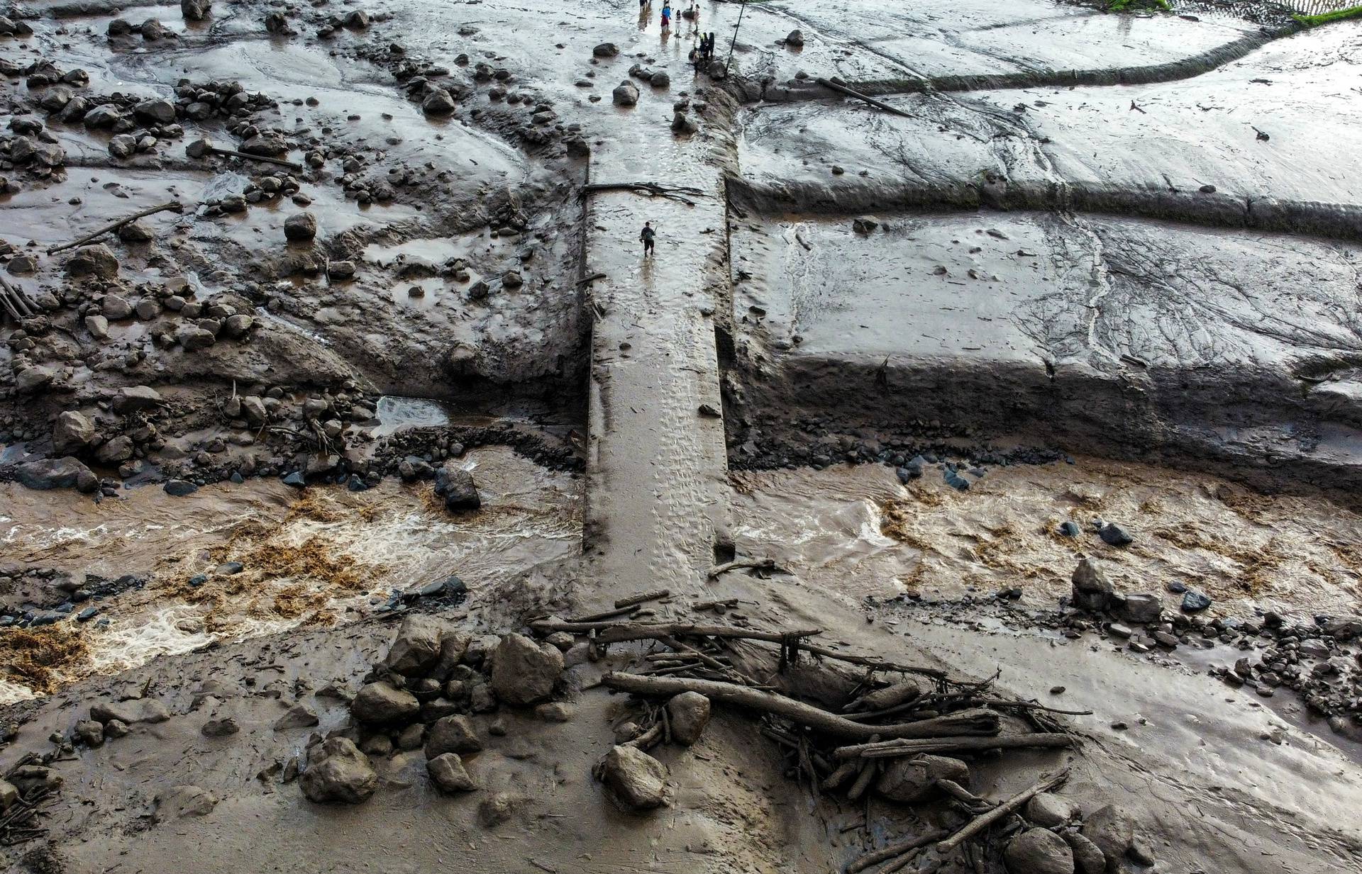 A drone view shows an area affected by heavy rain brought flash floods and landslides in Tanah Datar