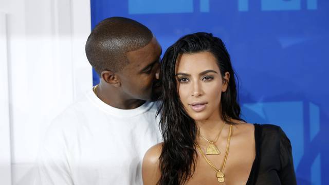 Kim Kardashian and Kanye West arrive at the 2016 MTV Video Music Awards in New York