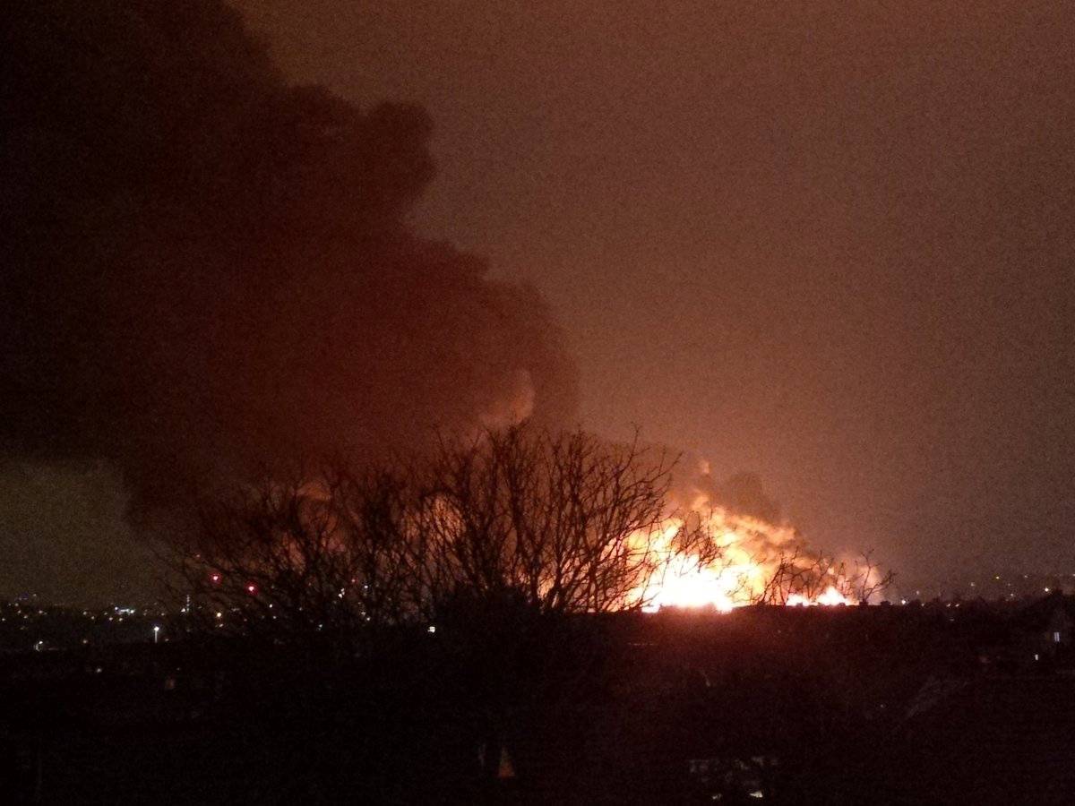 Smoke rises from a fire at a paint factory in Brent Cross, London