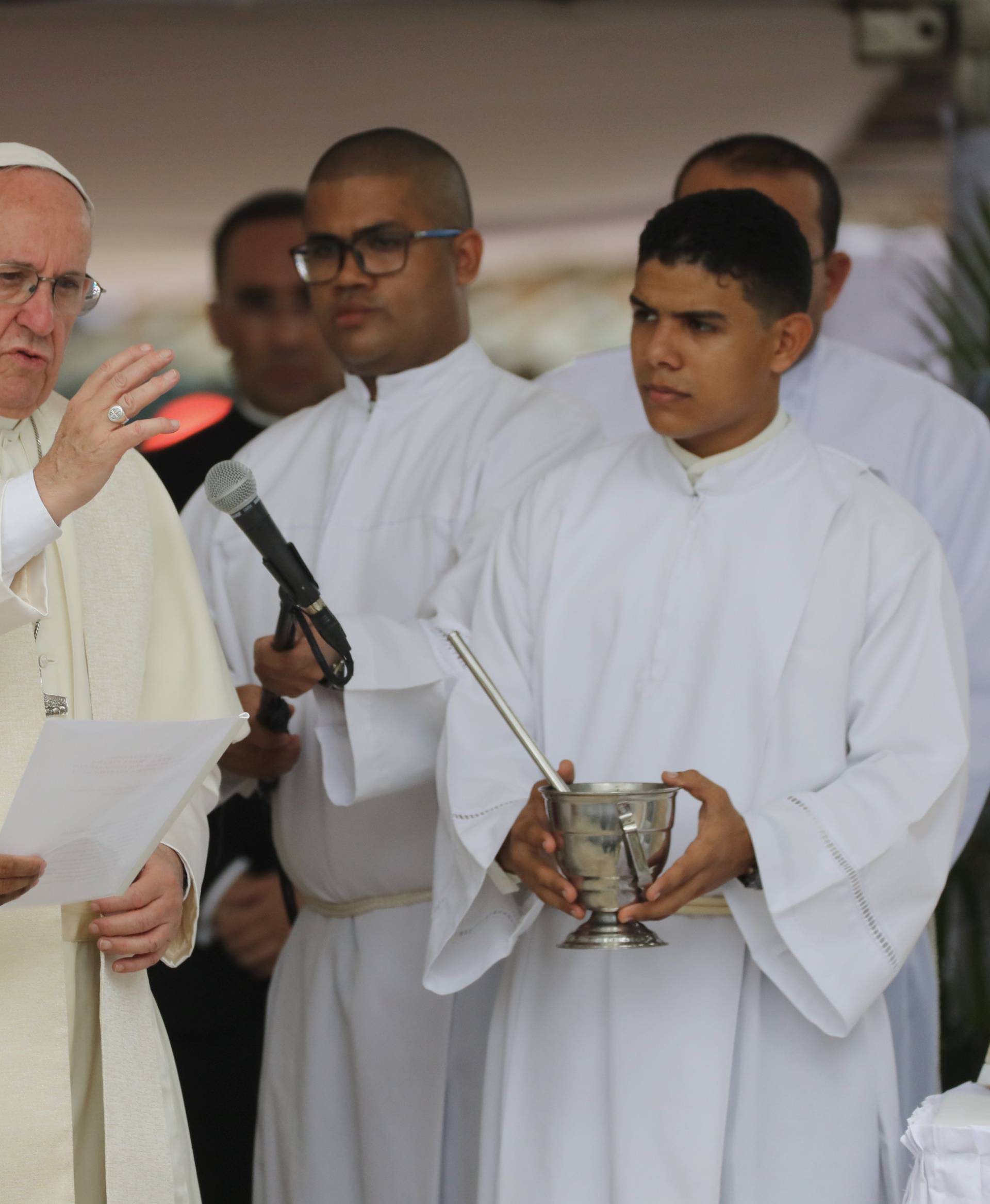 Pope Francis gives a blessing during a visit to San Francisco neighbourhood in Cartagena