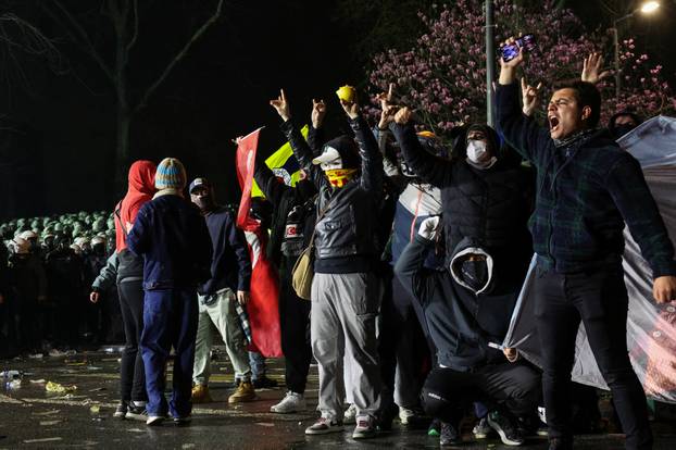 People take part in a protest on the day Istanbul Mayor Ekrem Imamoglu was jailed as part of a corruption investigation, in Istanbul