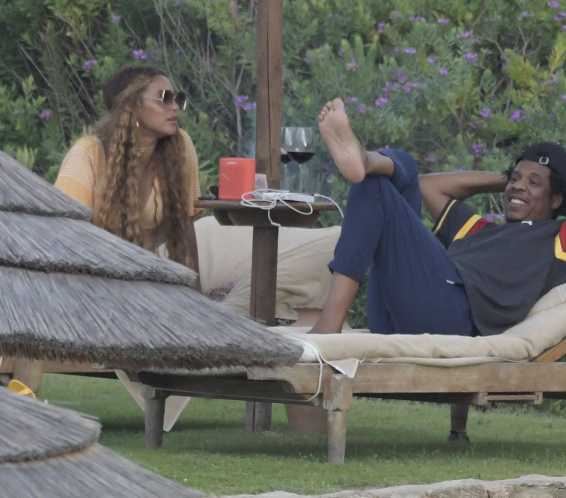 Beyonce and Jay Z enjoy a glass of wine together as they continue their Italian vacation