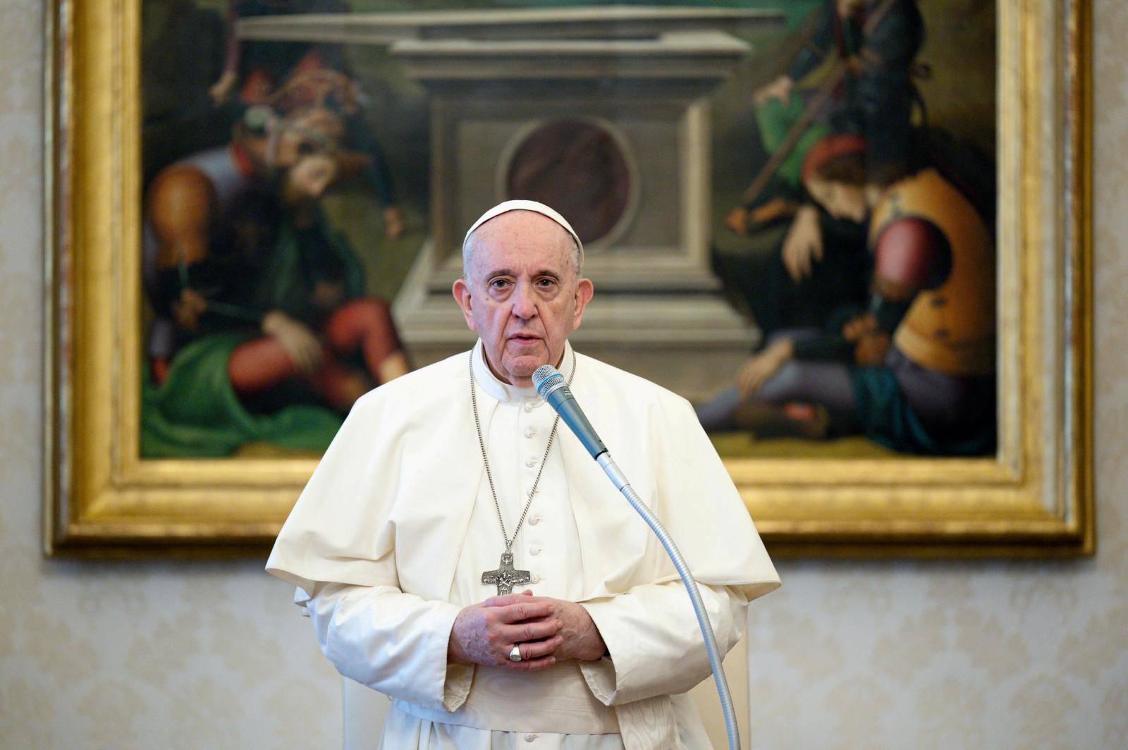 FILE PHOTO: Pope Francis delivers his weekly general audience virtually in the pope's official private library in the Apostolic Palace at the Vatican