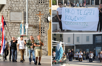 FOTO Kraj molitelja u Šibeniku žene nosile transparent sa SOS brojem za žrtve nasilja