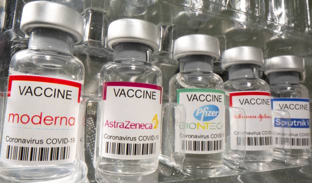 Vials labelled "Moderna, AstraZeneca, Pfizer - Biontech, Johnson&Johnson, Sputnik V coronavirus disease (COVID-19) vaccine" are seen in this illustration picture