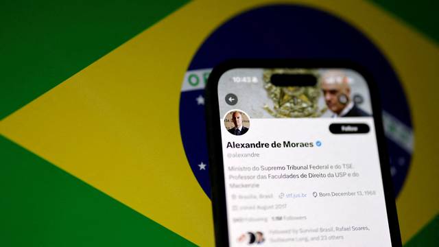 The X account of Brazil's Supreme Court Justice Alexandre de Moraes is seen on a mobile screen in this illustration