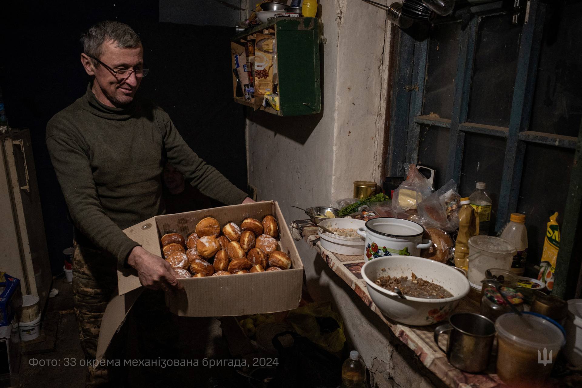 Ukrainian servicemen celebrate Christmas Eve in a front line in Dnipropetrovsk region