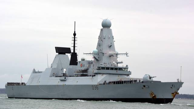 Russian forces fire warning shots at Royal Navy destroyer