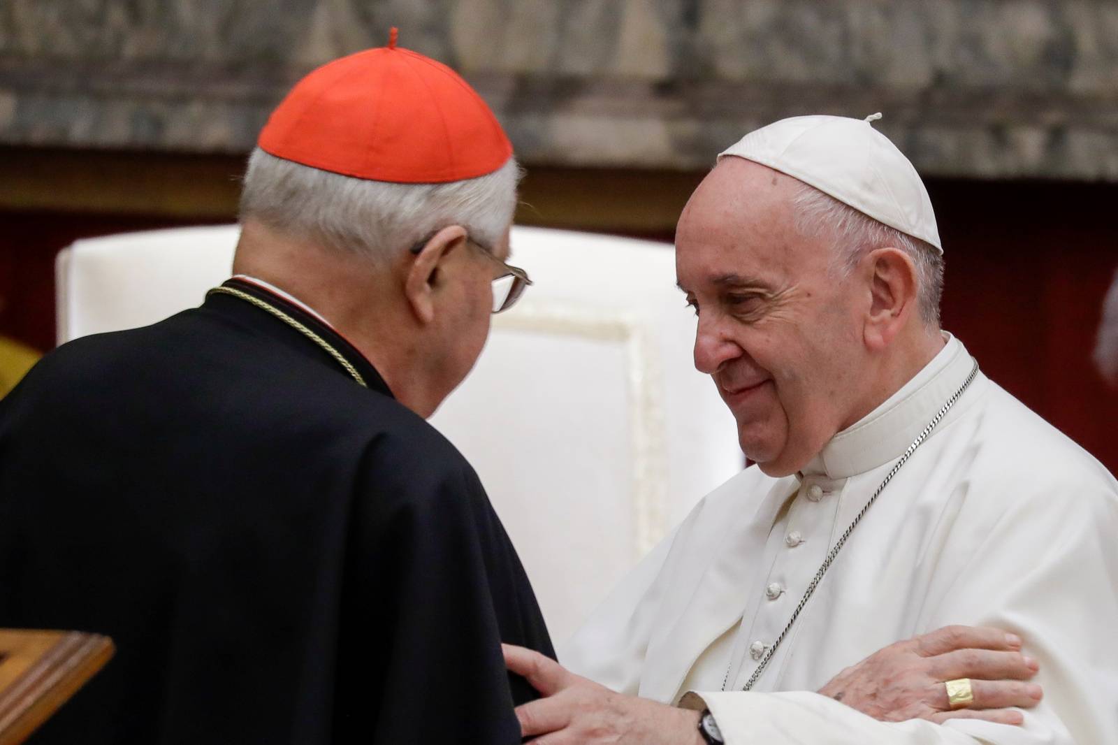 Pope Francis greets Cardinal Angelo Sodano on the occasion of his traditional greetings to the Roman Curia in the Sala Clementina (Clementine Hall) of the Apostolic Palace, at the Vatican