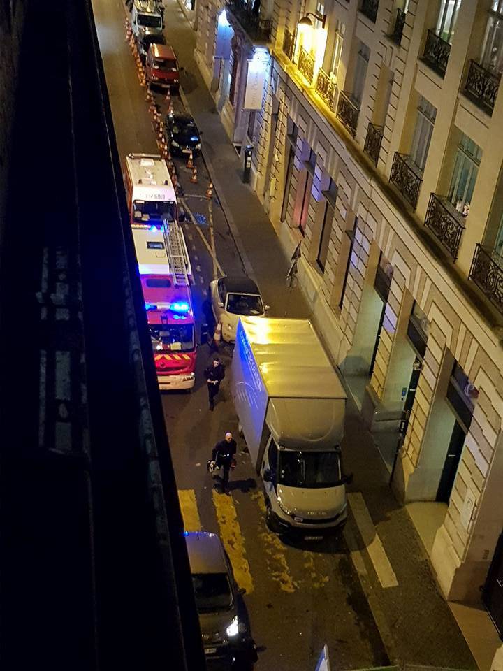 Vehicles are seen after axe-wielding robbers stole jewelry at the Ritz Paris hotel in Paris