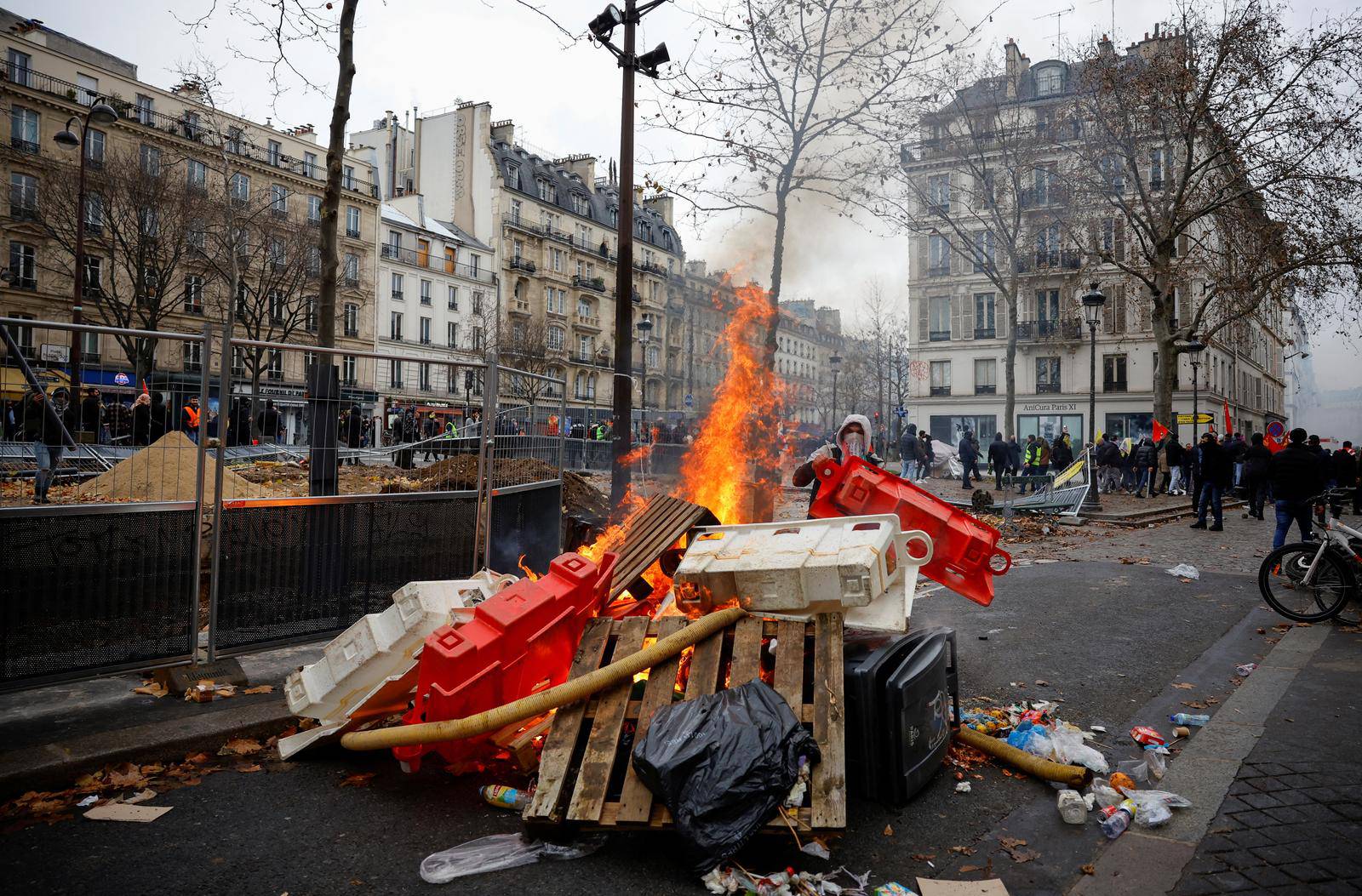 Members of the Kurdish community gather at the Place de la Republique square following the shooting, in Paris