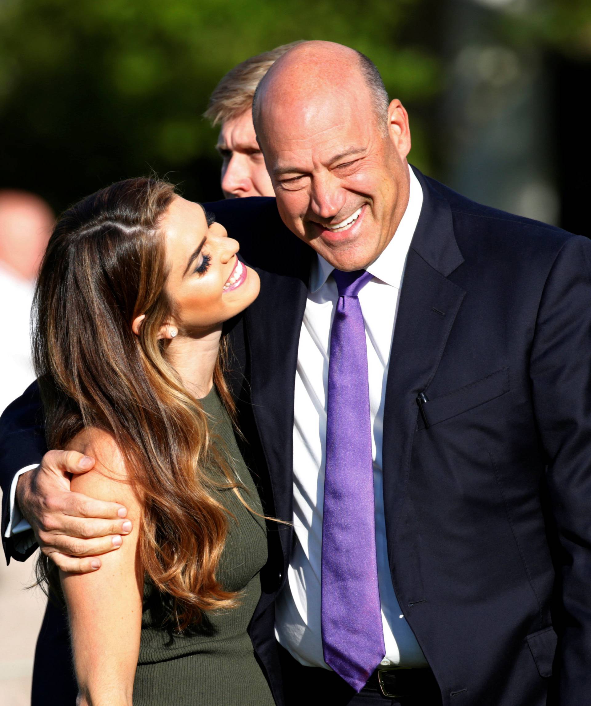 Trump's communication director Hope Hicks and Trump's economic adviser Gary Cohn speak before observing a moment of silence in remembrance of those lost in the 9/11 attacks at the White House in Washington