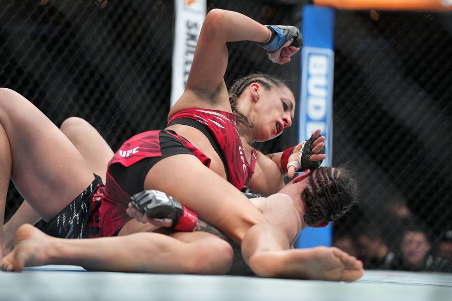 Edmonton, Canada. 02nd Nov, 2024. EDMONTON, CANADA - NOVEMBER 2: Ivana Petrovic battles Jamey-Lyn Horth in their Women's Flyweight fight during the UFC FIGHT NIGHT EDMONTON event at Rogers Place on November 2, 2024 in Edmonton, Canada. (Photo by Marcelo W