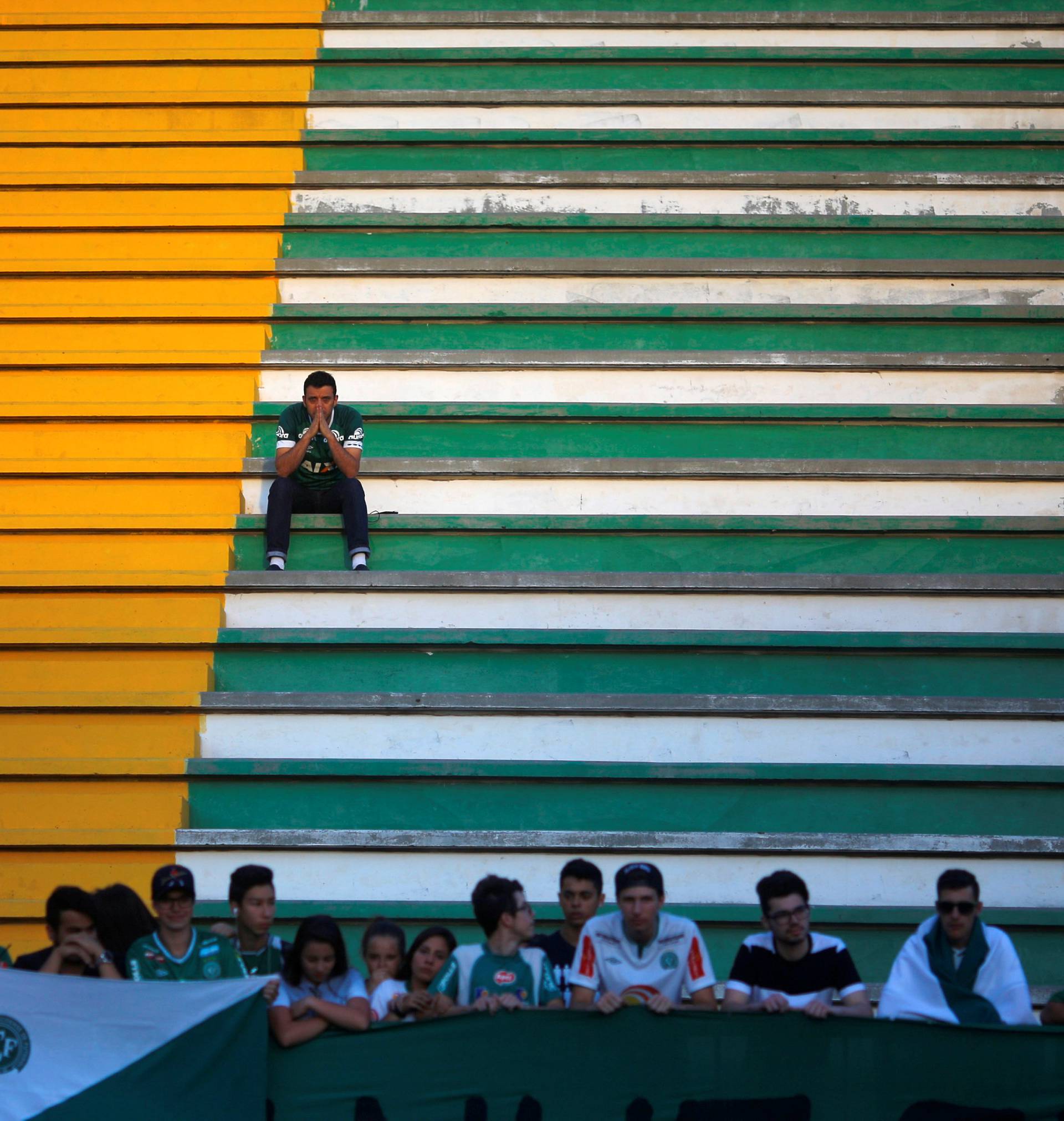 Fans of Chapecoense soccer team pay tribute to Chapecoense's players at the Arena Conda stadium in Chapeco