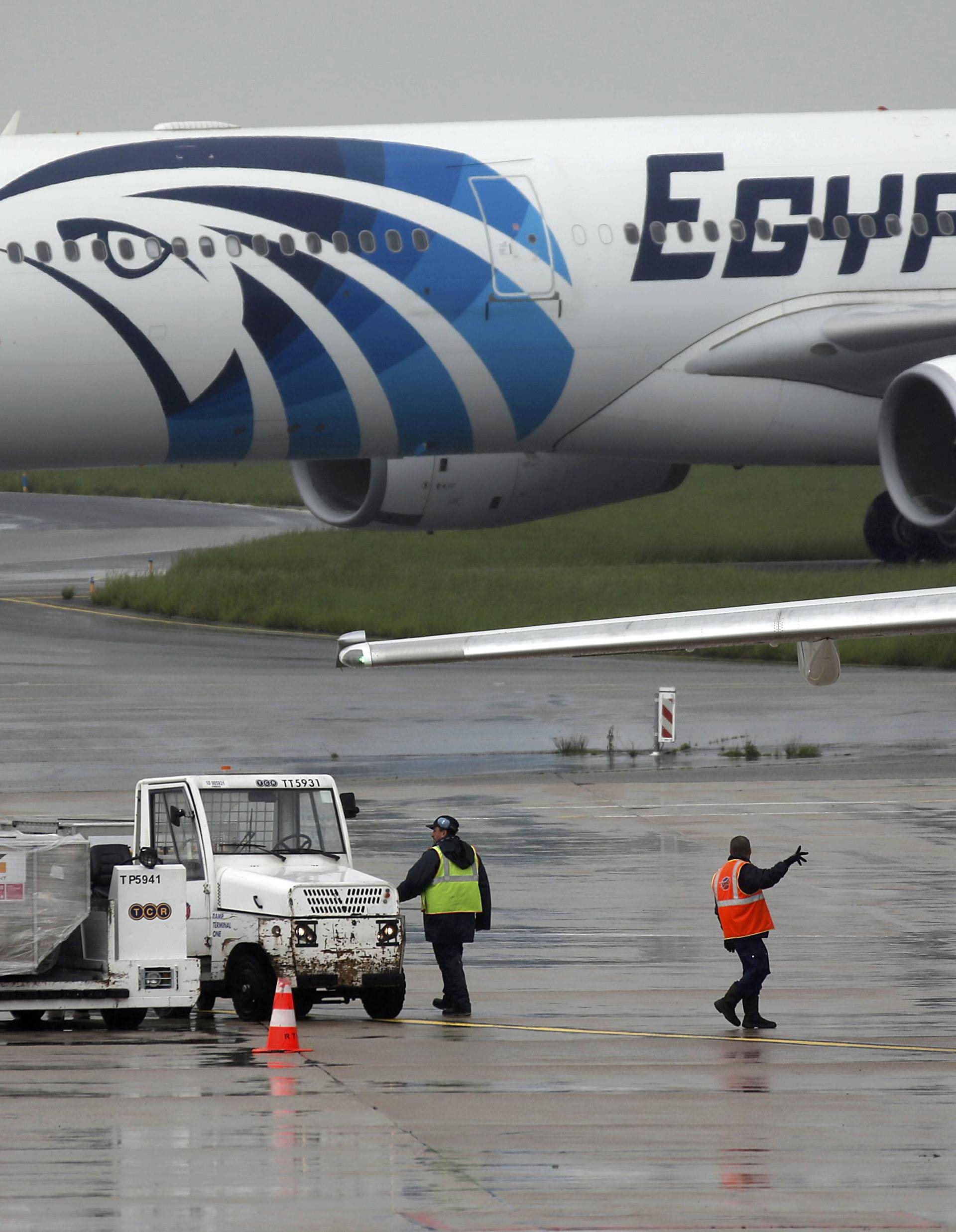 The EgyptAir plane scheduled to make the following flight from Paris to Cairo  taxies on the tarmac at Charles de Gaulle airport in Paris