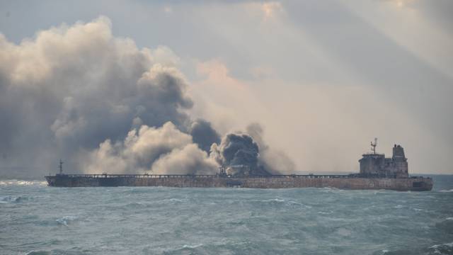 Smoke is seen from the Sanchi tanker which went ablaze after a collision with a Chinese freight ship in the East China Sea