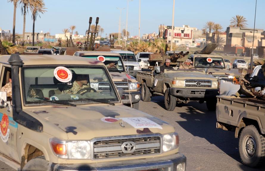 Military vehicles of Misrata forces, under the protection of Tripoli's forces, are seen in Tajura neighborhood, east of Tripoli