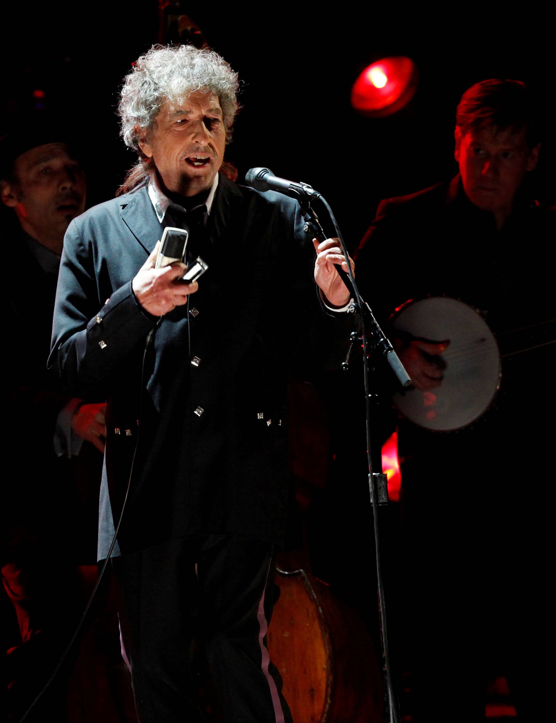 FILE PHOTO: Singer Bob Dylan performs during a segment honoring Director Martin Scorsese in Los Angeles