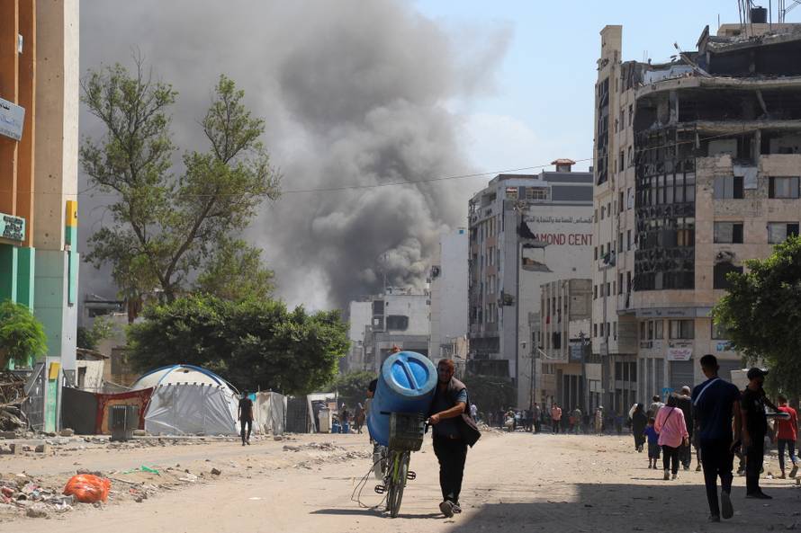 Aftermath of Israeli strikes on residential buildings, in Gaza City