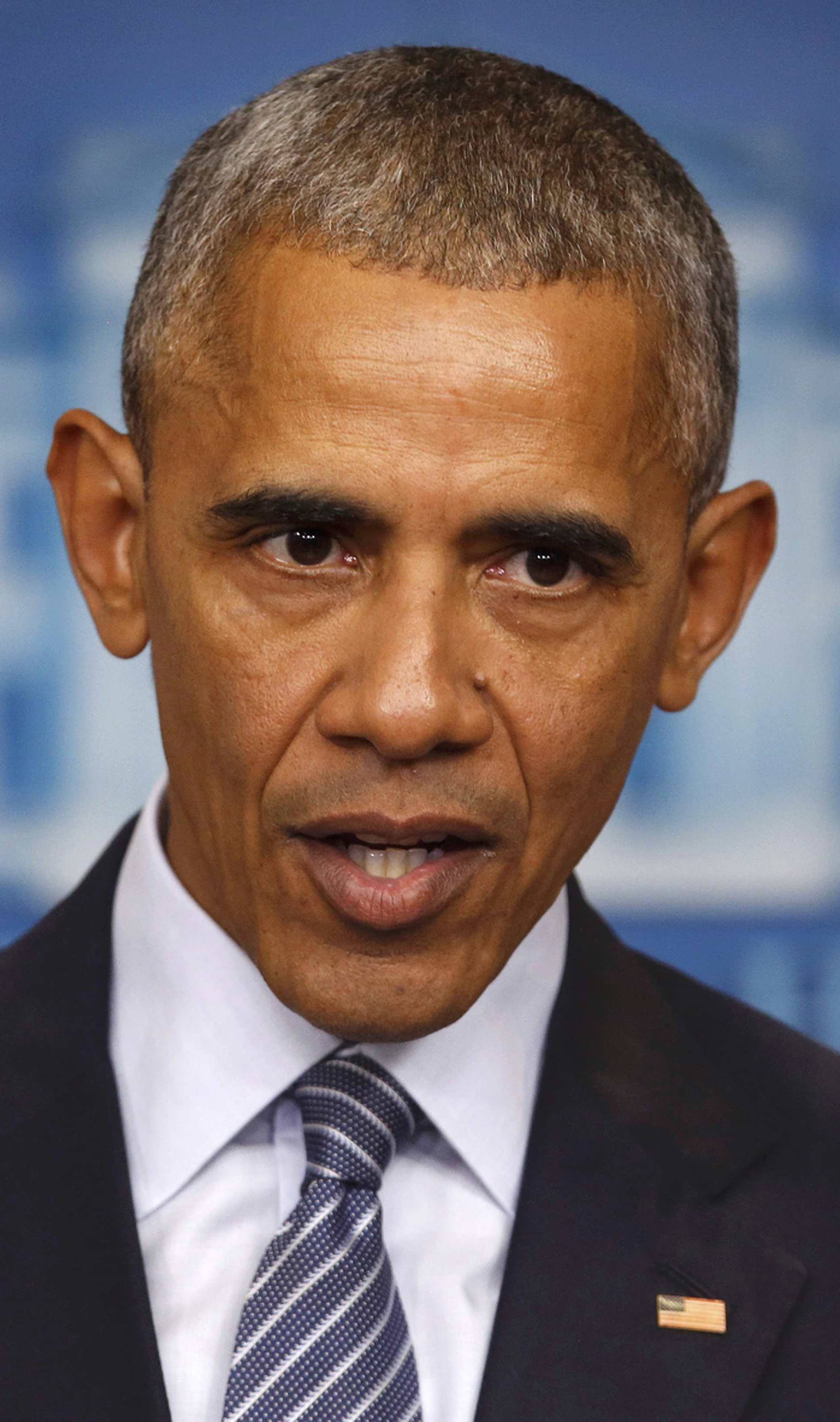 US President Barack Obama participates in news conference at the White House in Washington