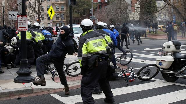 Protesters clash with police during demonstration against Trump on the sidelines of the inauguration in Washington