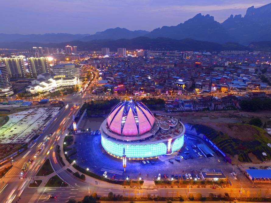 World's largest transparent-domed bar with a lotus-shaped retractable dome is seen in Zhangjiajie