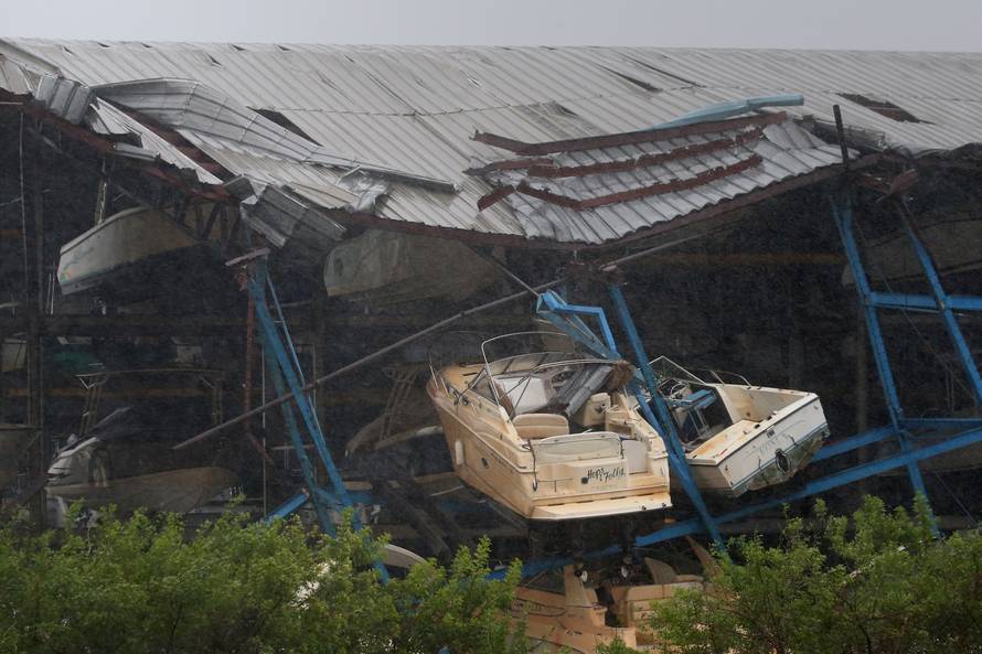 A boat rack storage facility lays destroyed after Hurricane Irma blew though Hollywood, Florida