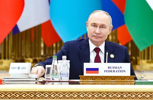 Russian President Vladimir Putin attends a forum in Ashgabat