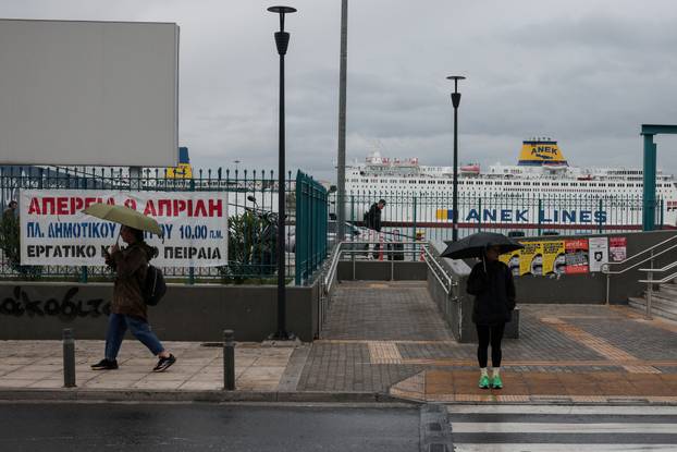 Greece's main labour unions strike over low wages