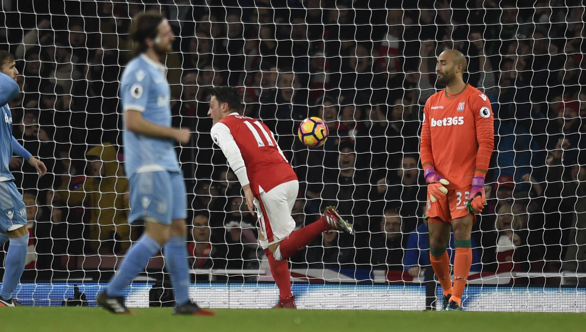 Arsenal's Mesut Ozil celebrates scoring their second goal