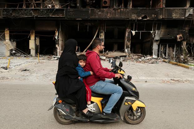 Displaced people return to their homes after a 10-day ceasefire between Lebanon and Israel went into effect, at the southern suburbs of Beirut